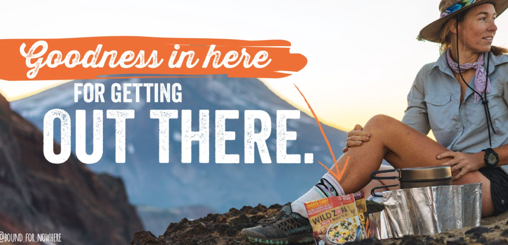 text overlaid on an image. the text reads: Goodness in here for getting out there. A picture of a woman camping.