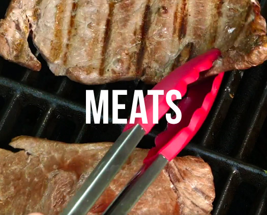 Meats. Steaks on a grill